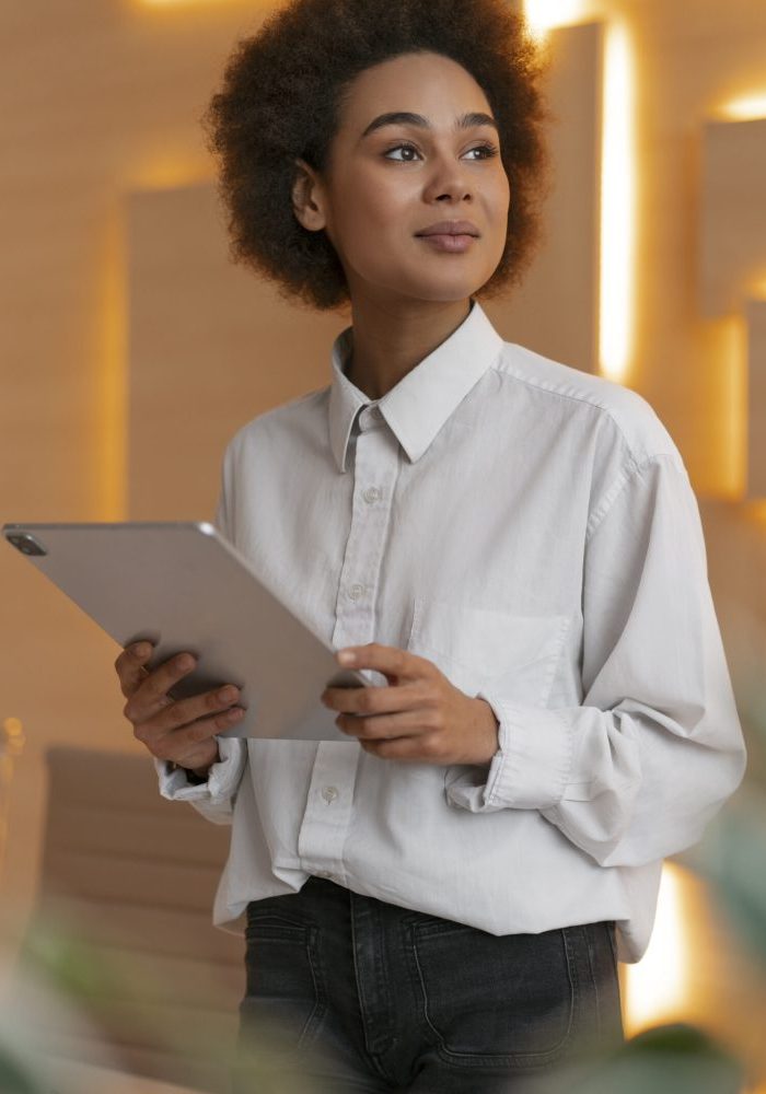 medium-shot-female-economist-holding-tablet-scaled-quxmv5e9g3gtm3u543gnwvl9028ni0v0l4ketqbrps