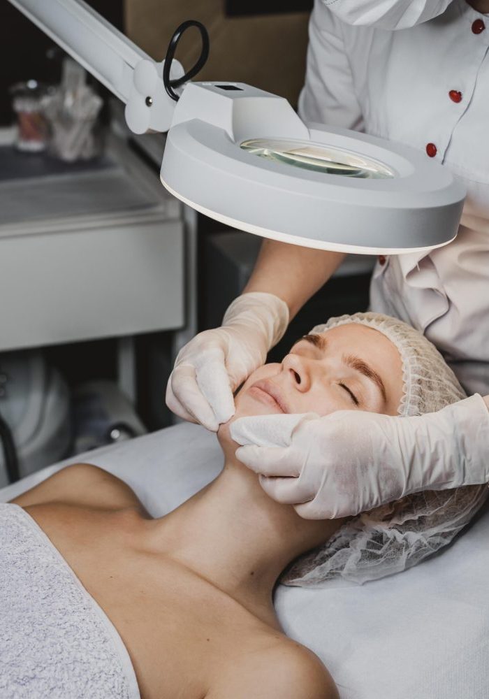 young-woman-getting-beauty-procedure-spa-scaled-quxmyd0espv3a567czfrxkey2gesssm010t4urkcgg